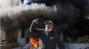 Lebanese demonstrators smash up, burn Beirut banks while protesting withdrawal limits